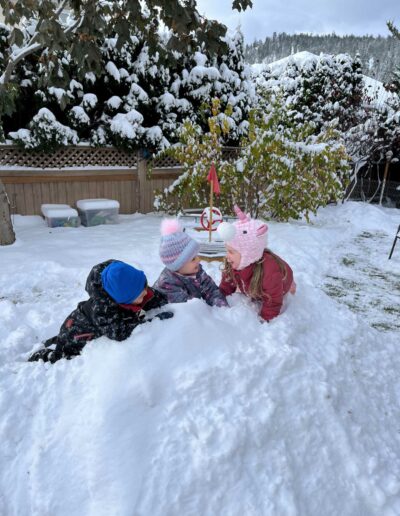 Montessori children playing in snow